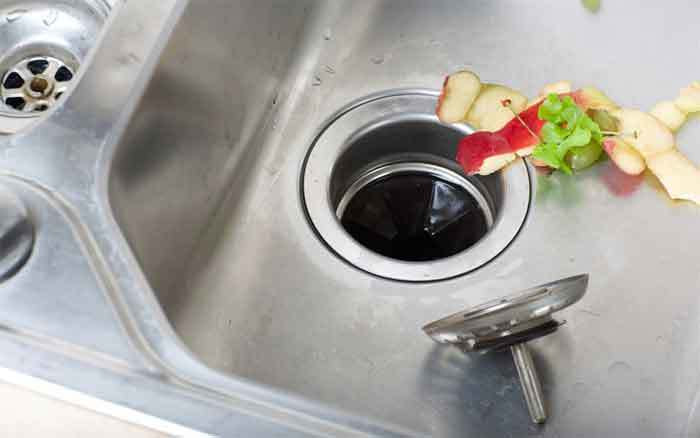 Why kitchen sink clogged past trap?